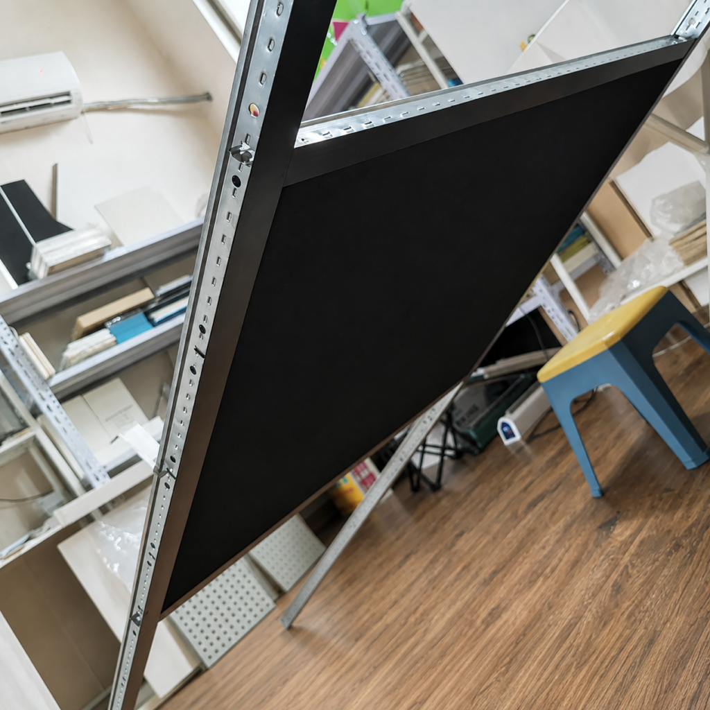 Black fiberglass acoustic ceiling panel with black surface finish