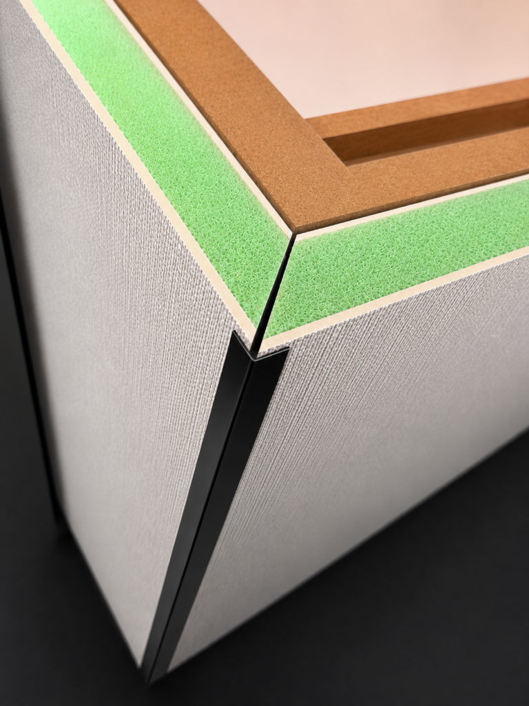 Layered composite sound insulation wall panel with decorative surface and resilient core