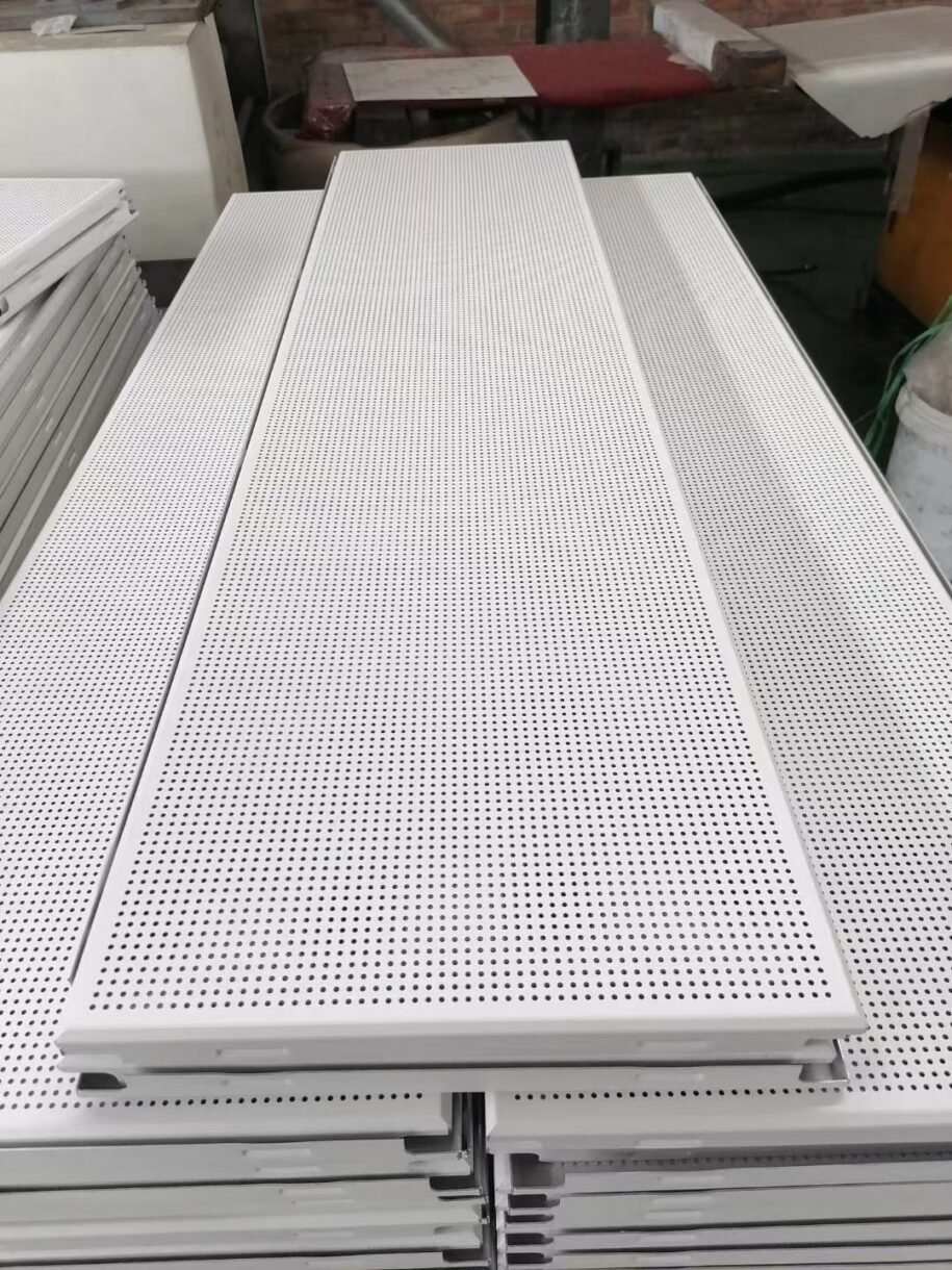 White perforated aluminum ceiling tiles for acoustic applications