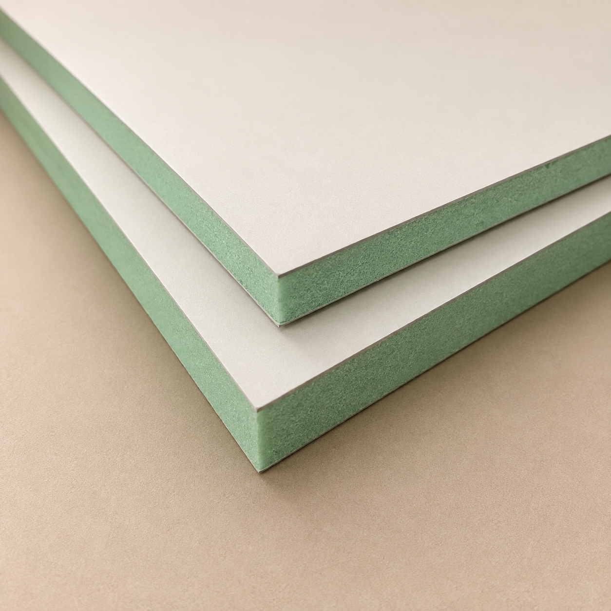 Close-up of smart sound-insulating wall panels featuring a specialized green core for commercial noise reduction.