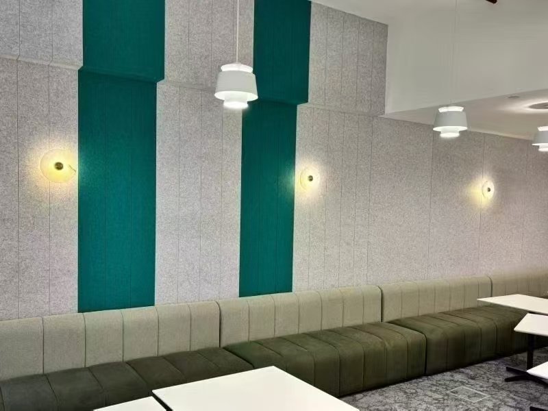 Dual-color PET polyester acoustic panels installed on commercial lounge and restaurant wall